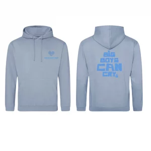 A dusty blue adult hoodie by Jamie’s Sanctuary, shown from the front and back. The front left chest features the Jamie’s Sanctuary logo in blue text. The back displays the bold statement “BIG BOYS CAN CRY” in large blue block letters, with a small teardrop graphic beneath the word "CRY." The hoodie has a drawstring hood and a large front pocket.